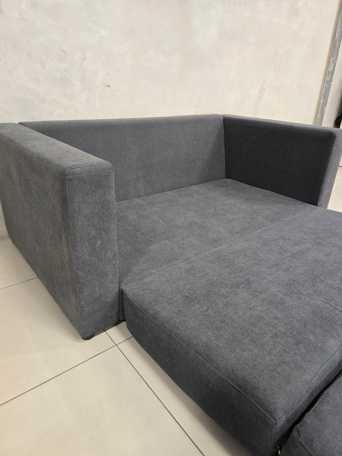 Space-saving sleeper sofa, made for contemporary and compact interiors.