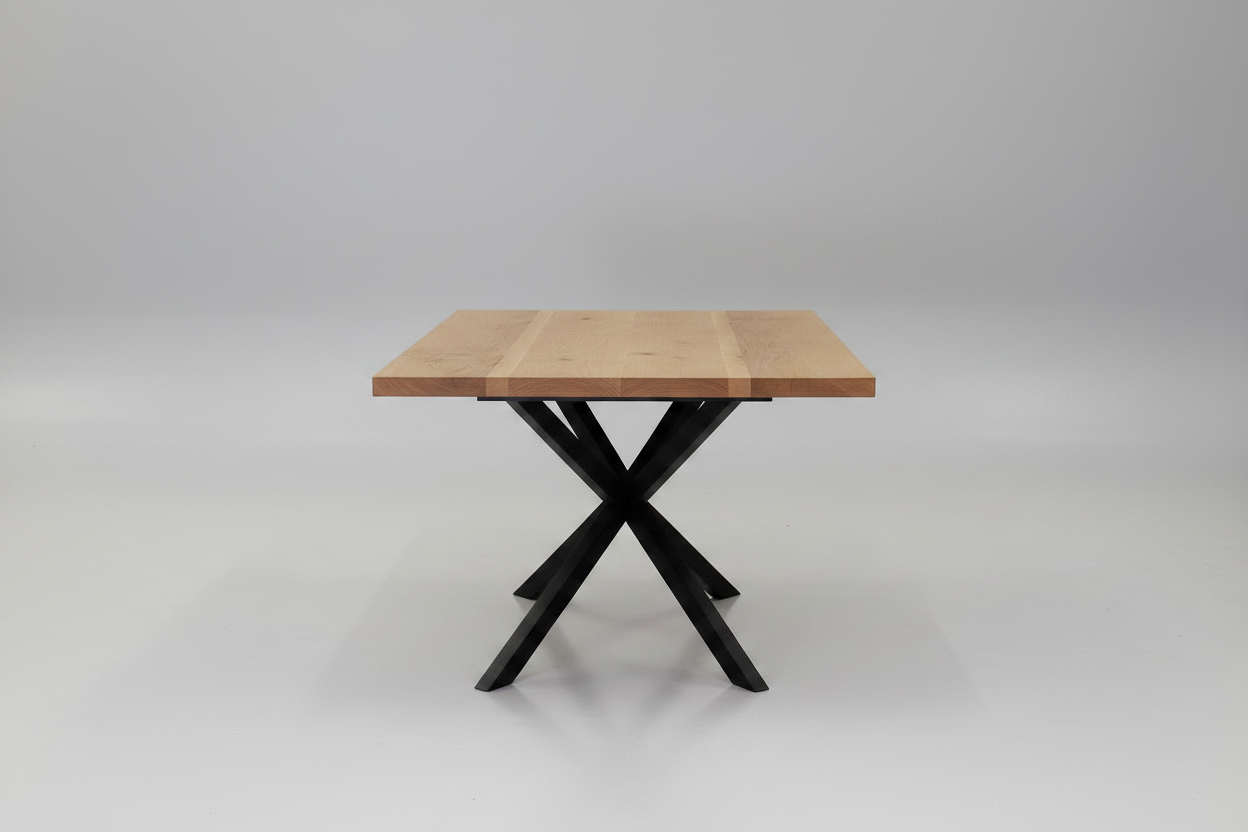 Wooden table with black metal legs on a white background