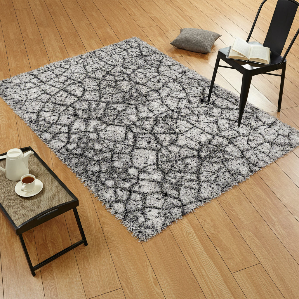 Lynx Gunpowder rug styled in a living room