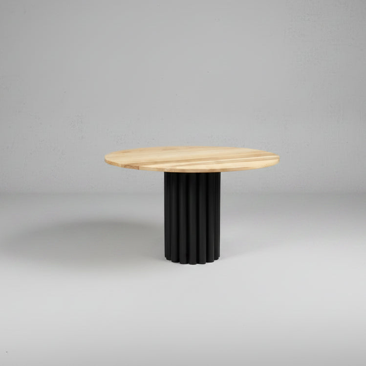 Round Fragmented Dining Table with oak veneer top and black steel tube base.