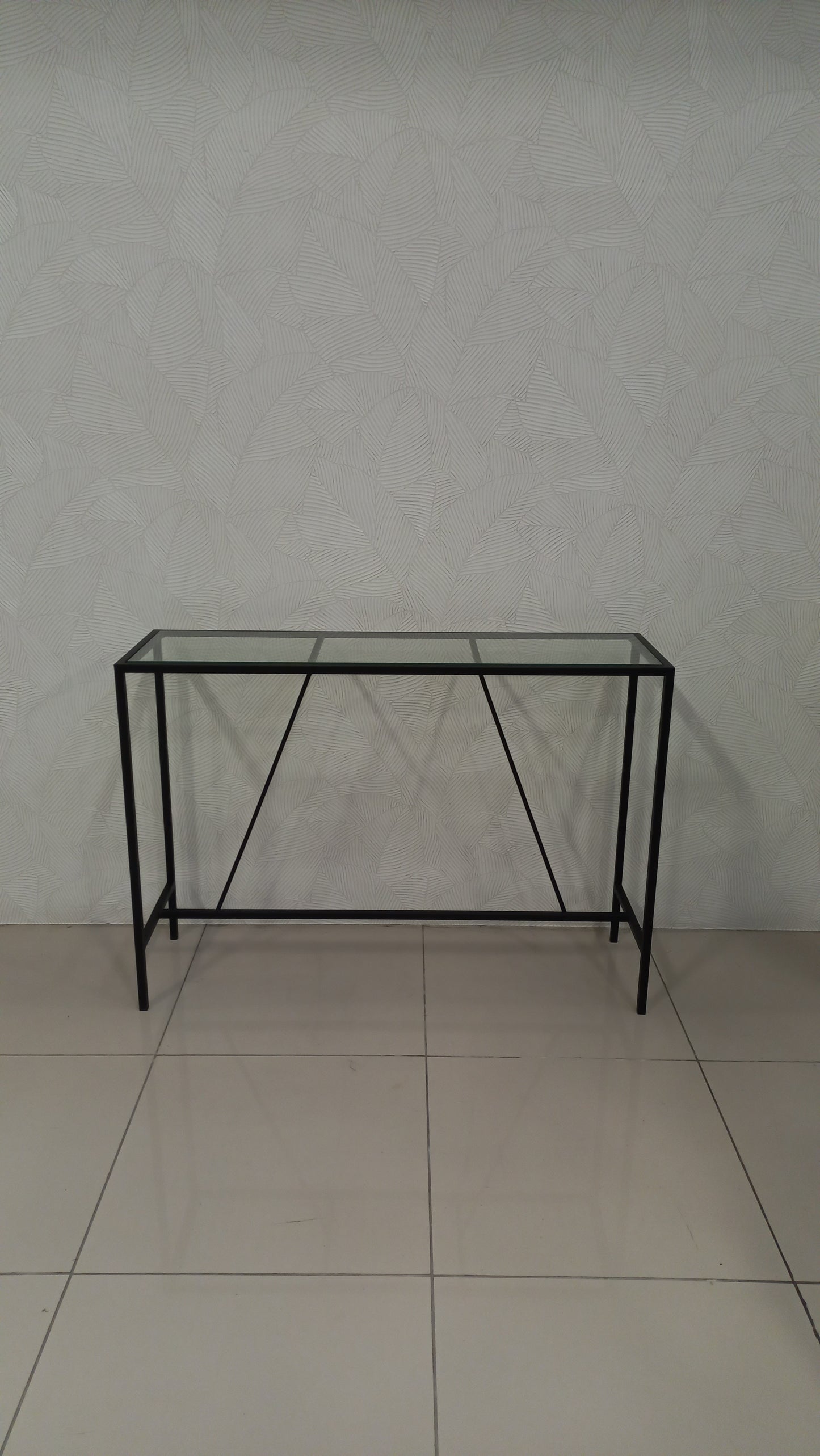 Modern glass top server, ideal for entryways or dining spaces.