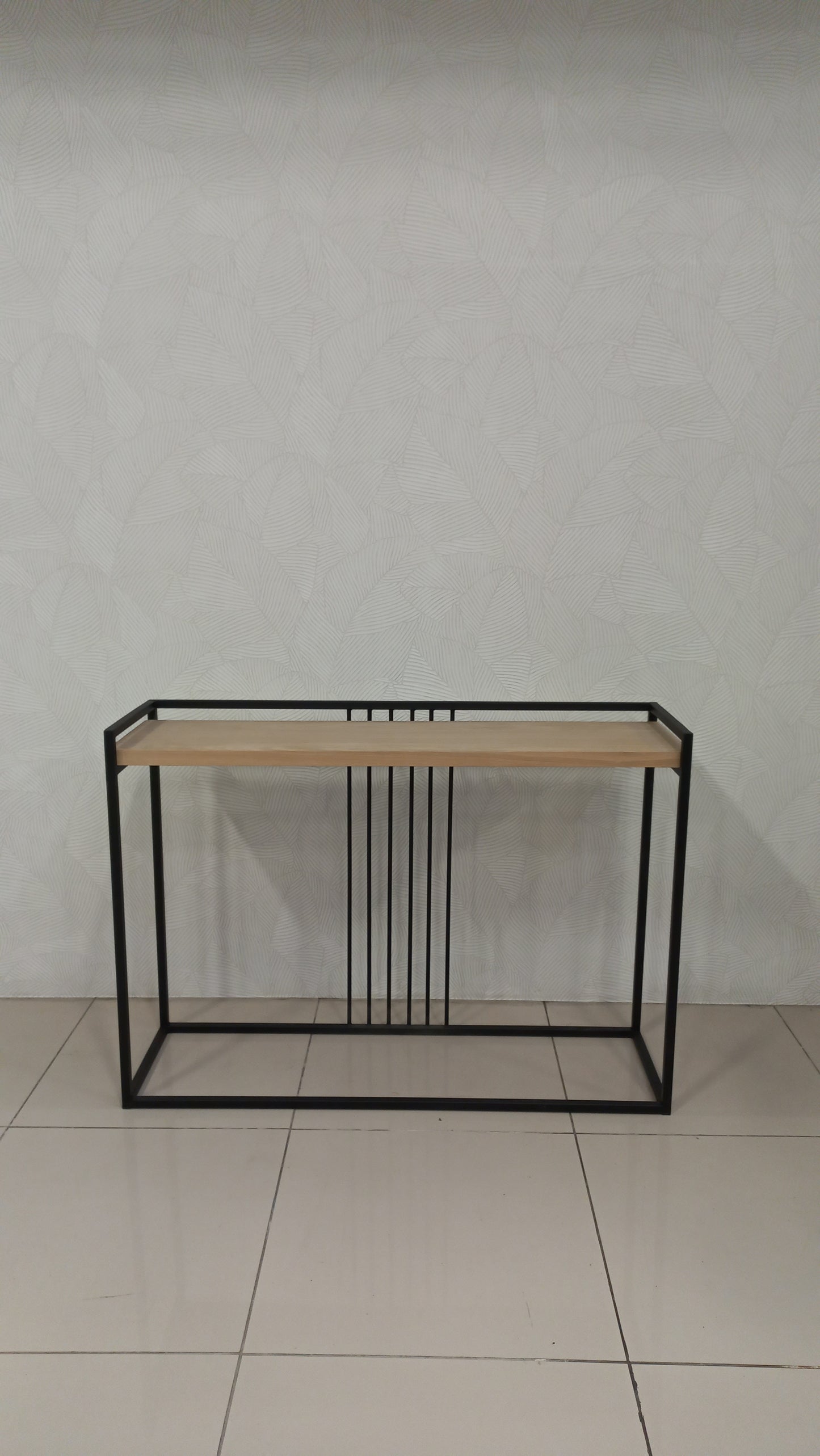 Wild Server with oak veneer top and black steel base.