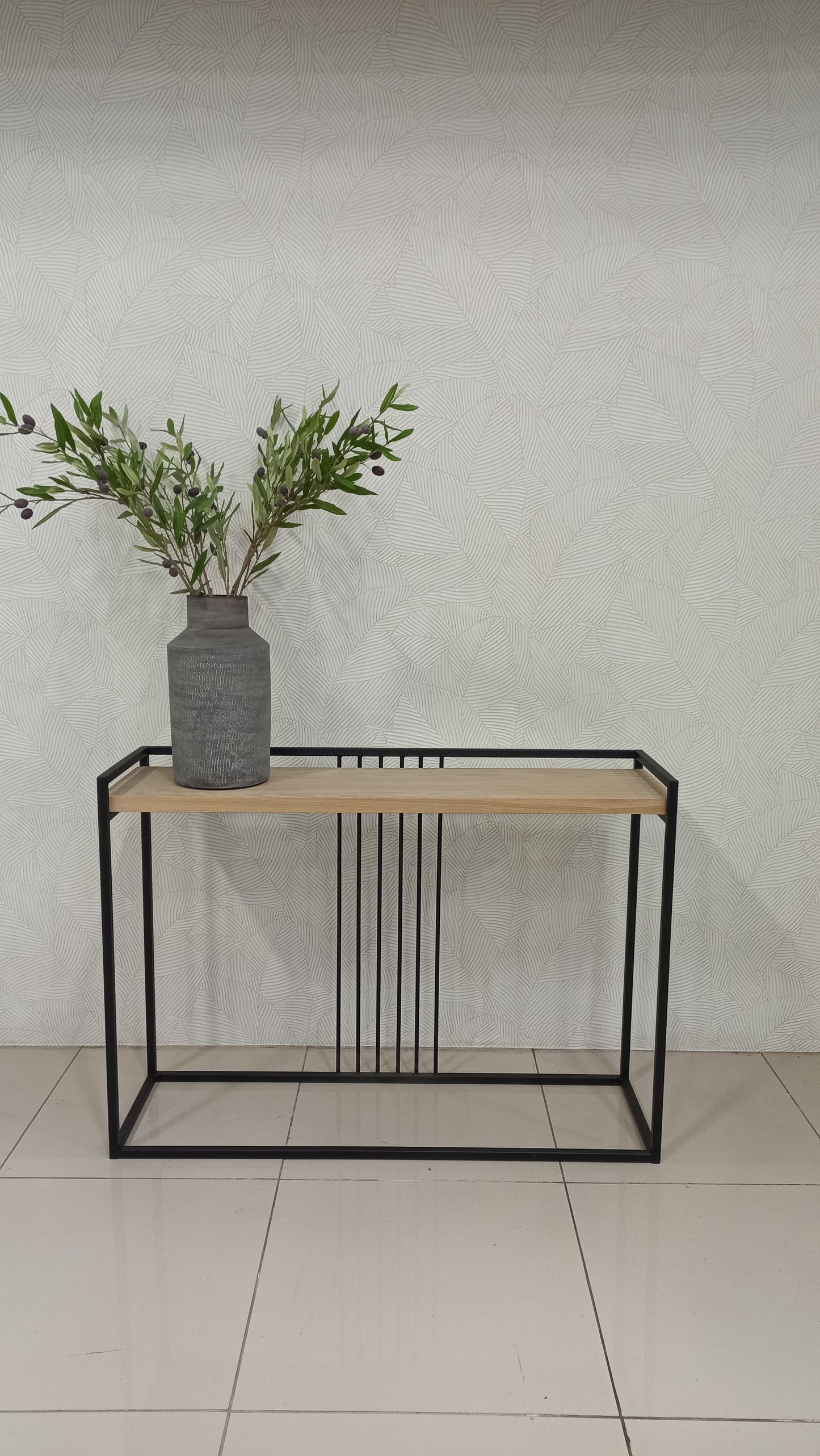Wild Server with oak veneer top and black steel base.