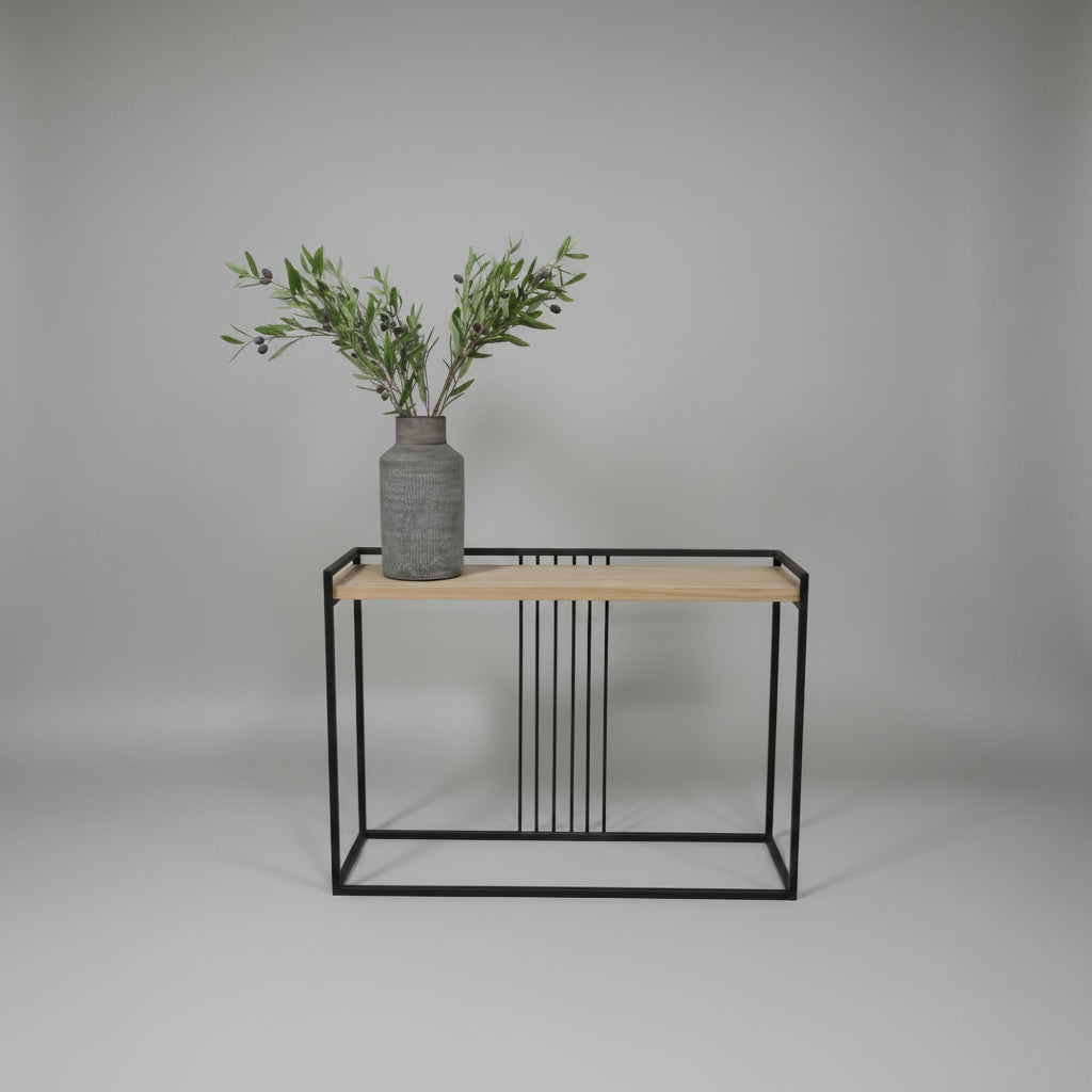 Wild Server with oak veneer top and black steel base.