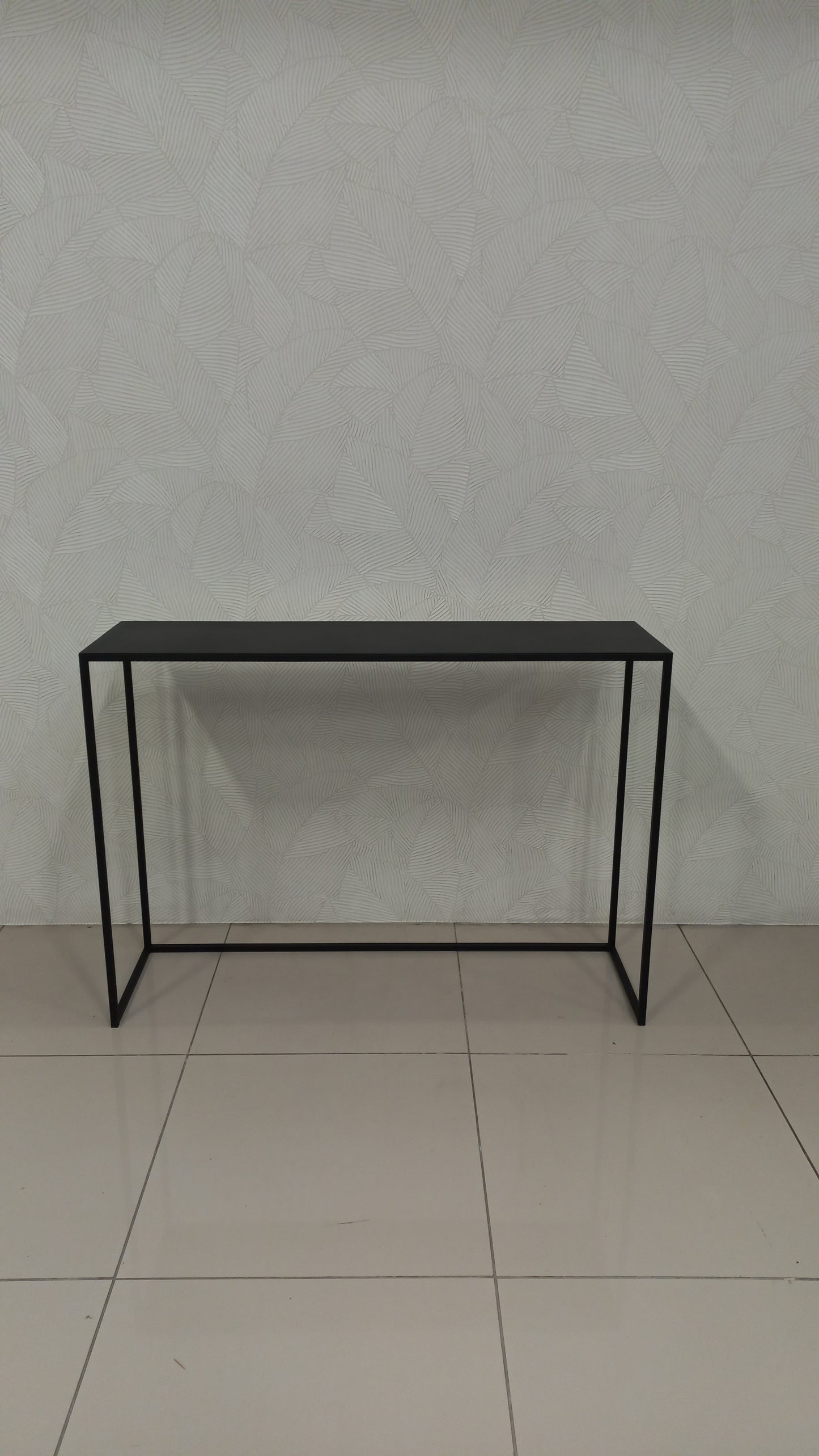 Matthew Server in black epoxy-coated steel, minimalist design.