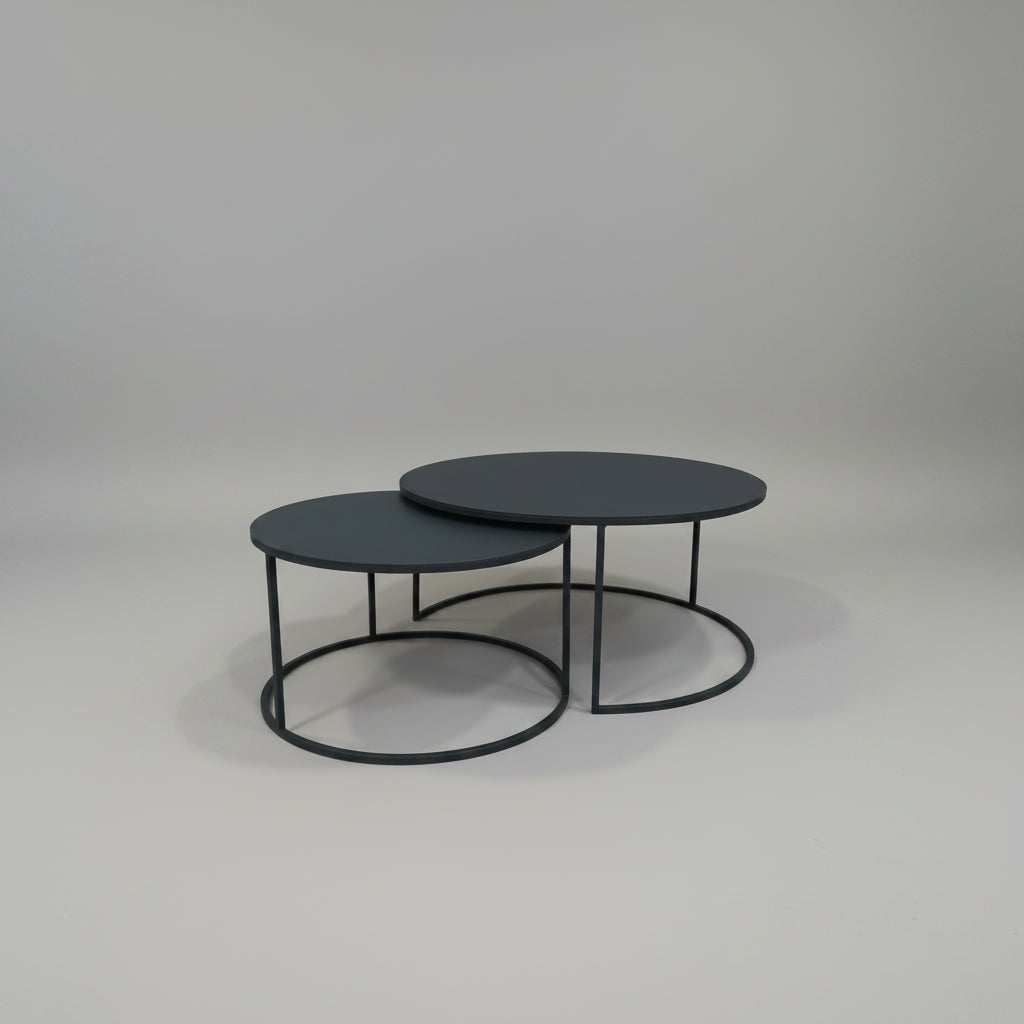 leek Black Round Nesting Table Set crafted from black epoxy-coated steel.