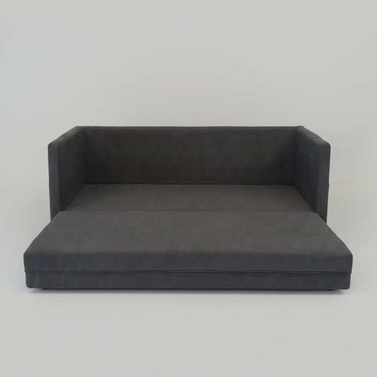 Close-up of the Mojo Sleeper Couch, highlighting its steel frame and customizable upholstery.