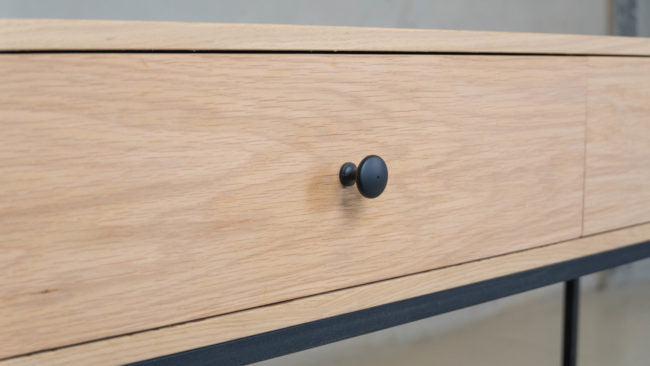 Lupin Server with oak veneer finish and black steel legs.