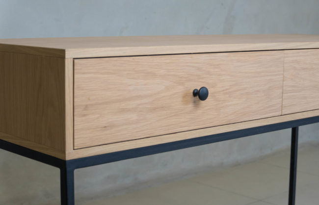 Lupin Server with oak veneer finish and black steel legs.