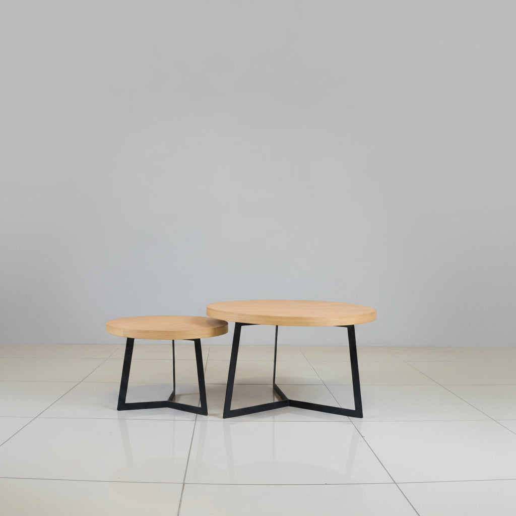 Eclipse nesting coffee table set with oak tops and black steel frames.