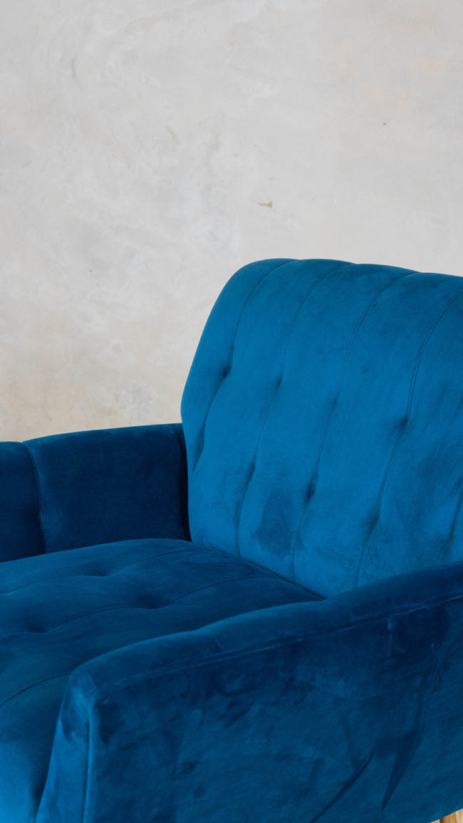 Minimalist low-seated chair, handcrafted in South Africa.
