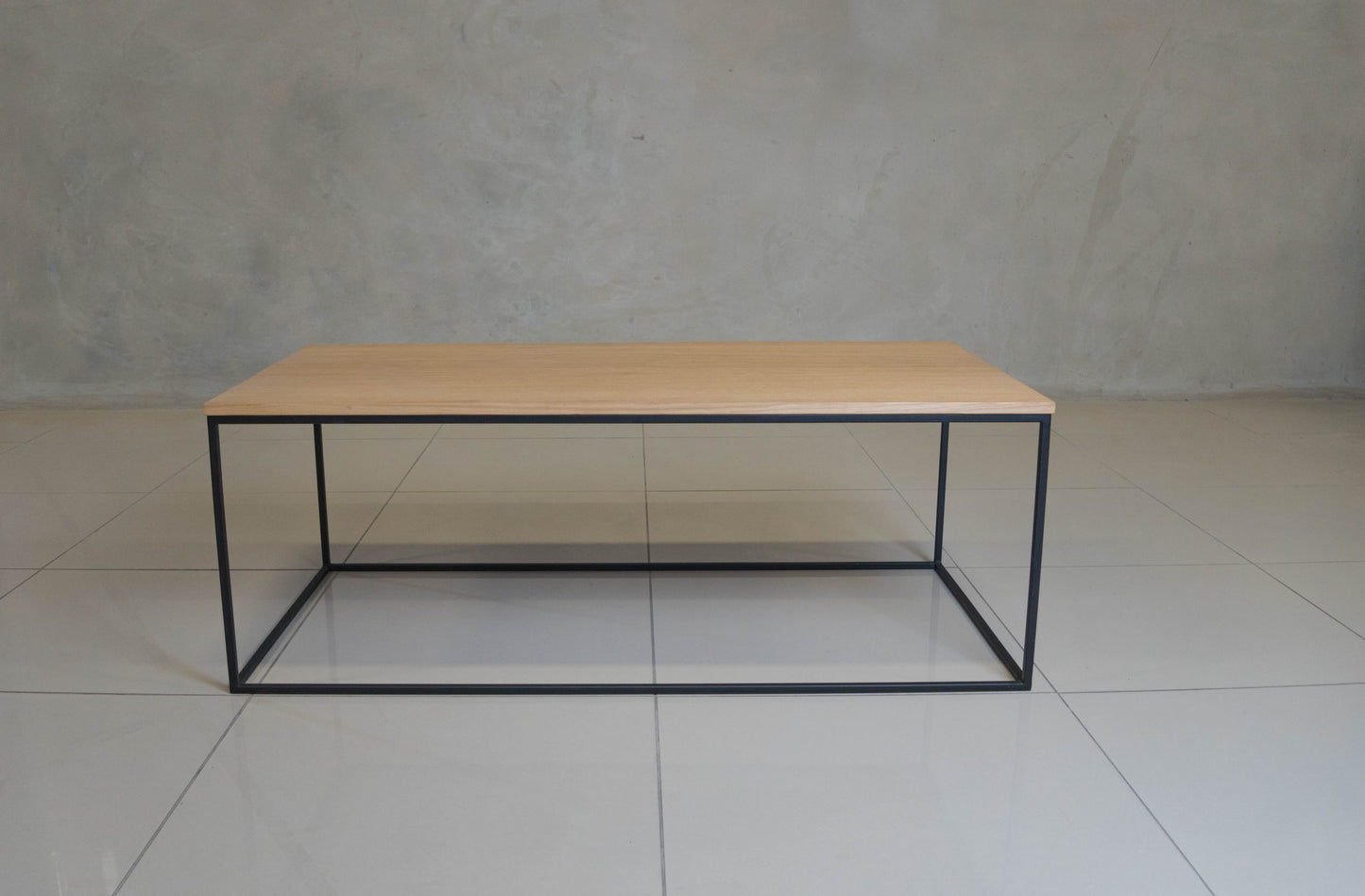 Minimalist black steel coffee table, perfect for modern spaces.