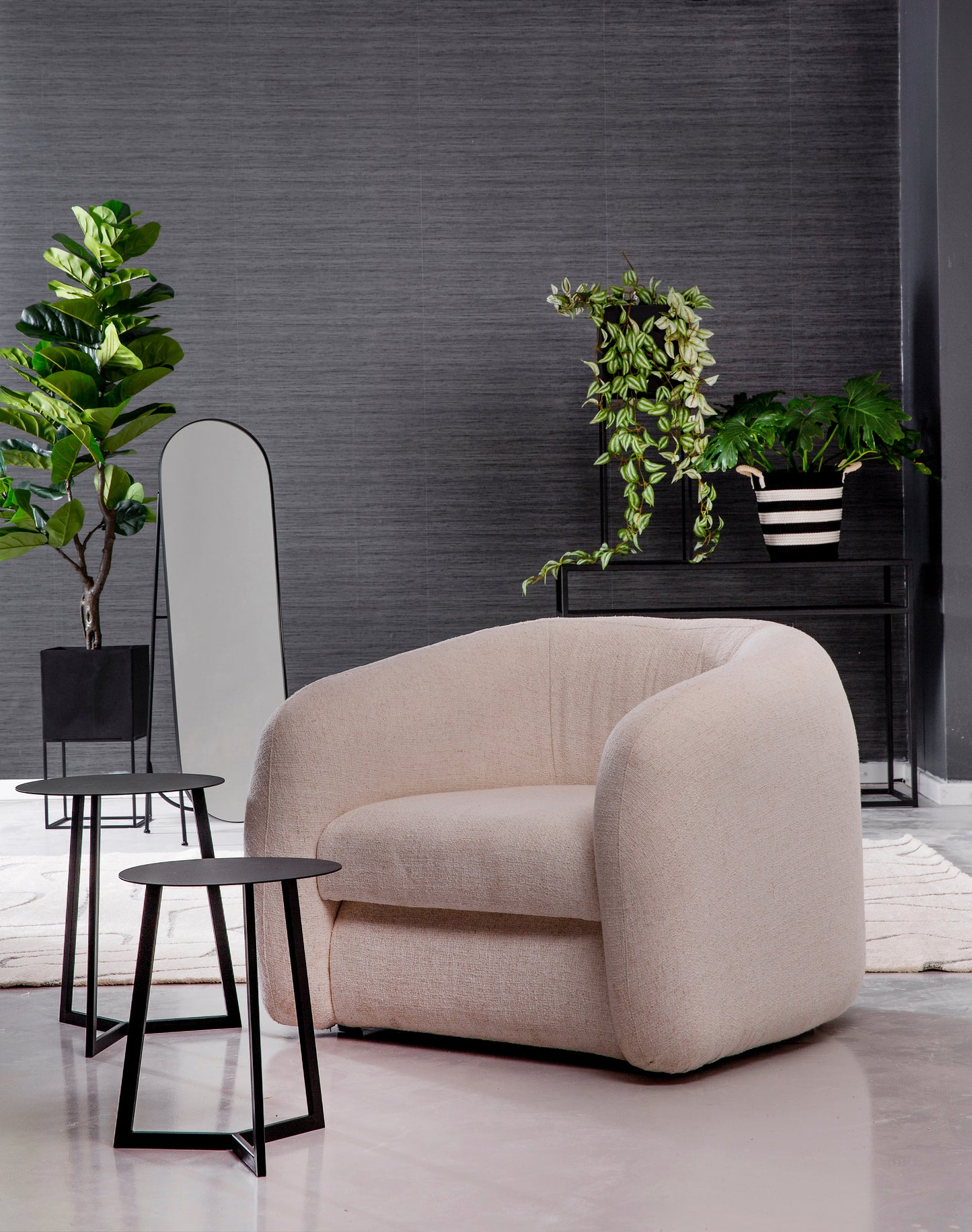 Shaun Tub Armchair with curved back and custom fabric.