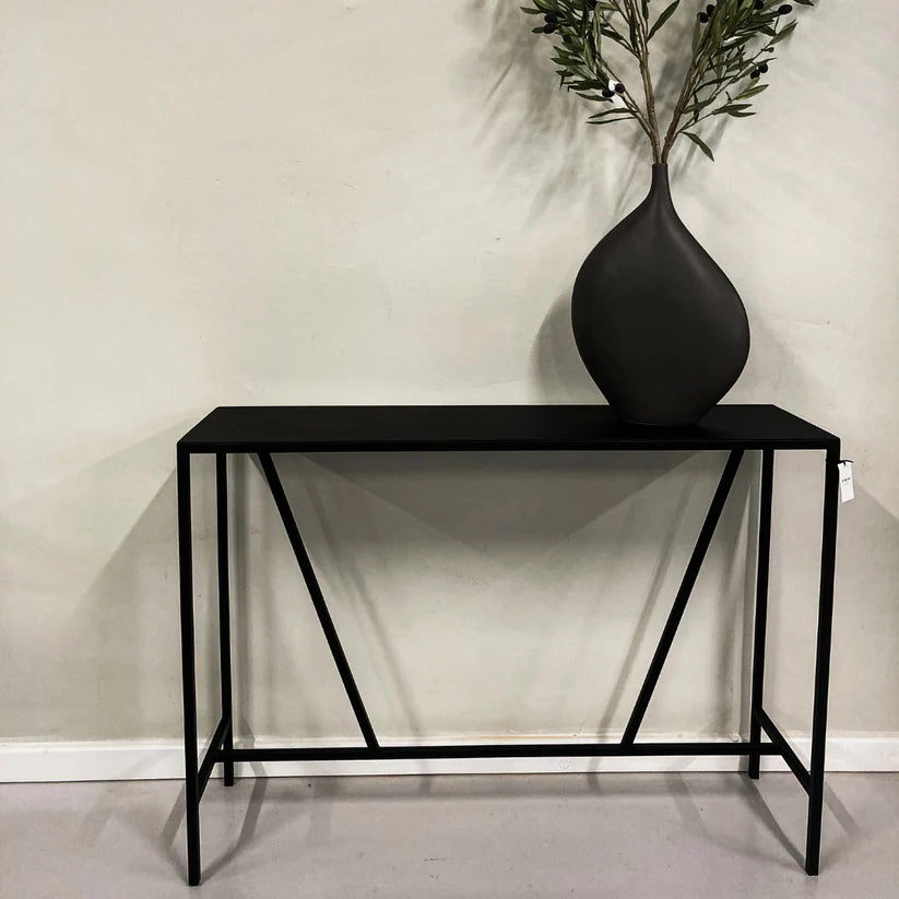Caroline Server in black epoxy-coated steel, minimalist design.