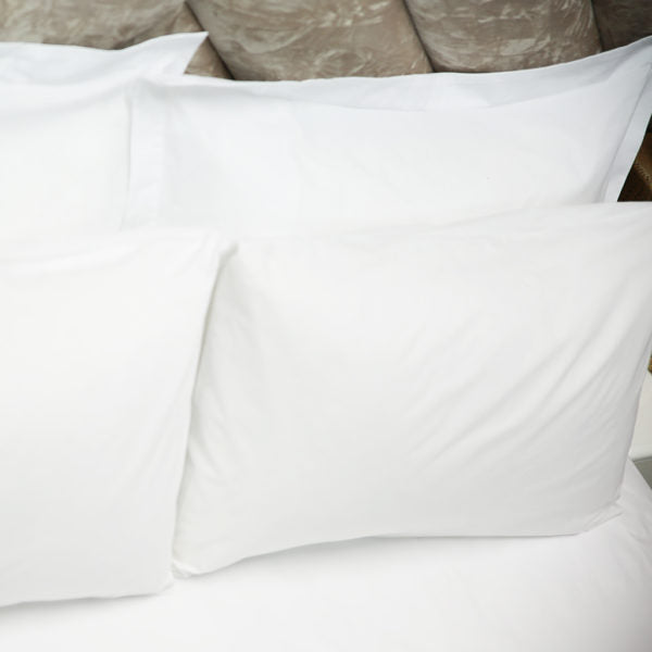 White Cotton Linen Pillowcases, offering soft and breathable comfort for your bed.