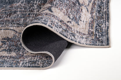 Close-up of a textured rug corner on a white background
