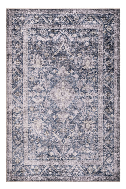Patterned rug with blue and beige colors on a white background