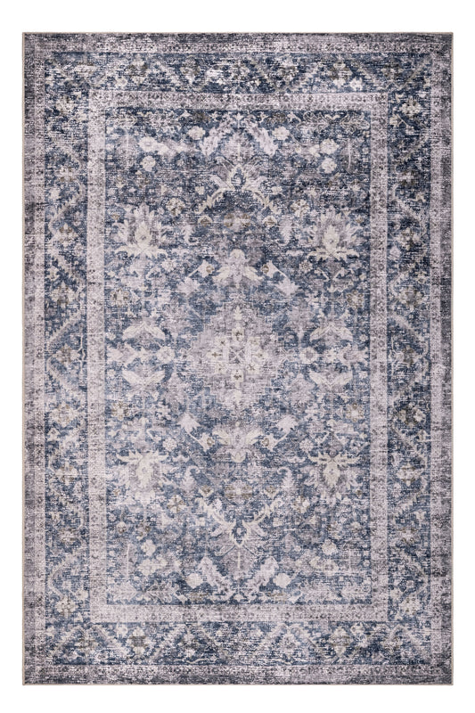 Patterned rug with blue and beige colors on a white background