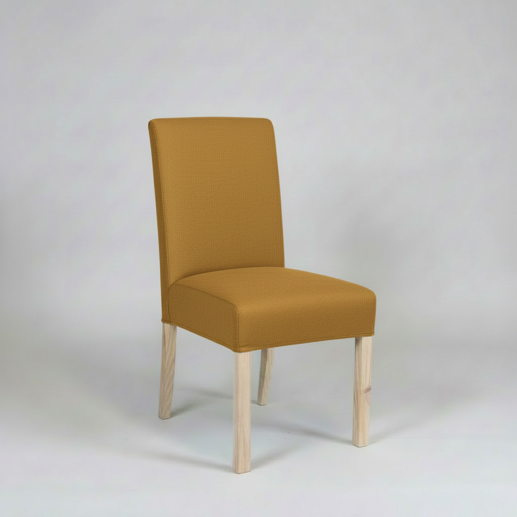 Mustard yellow chair with wooden legs on a white background