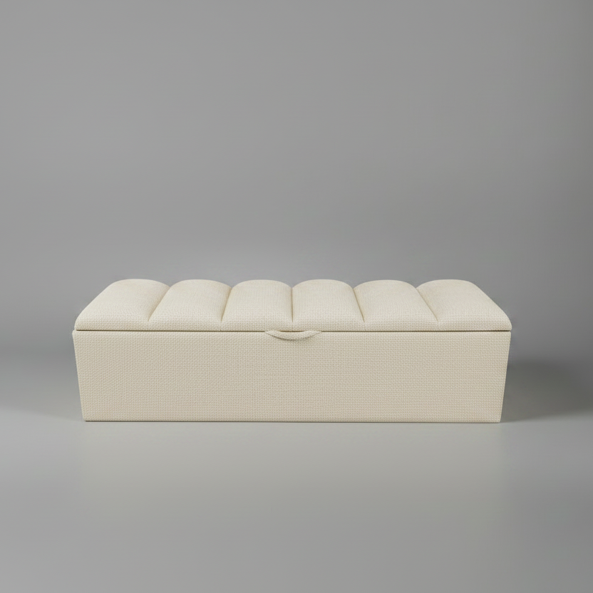 Beige ottoman on a gray background