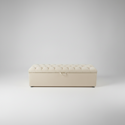 Gray tufted bench on a light gray background