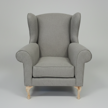 Gray armchair on a light gray background