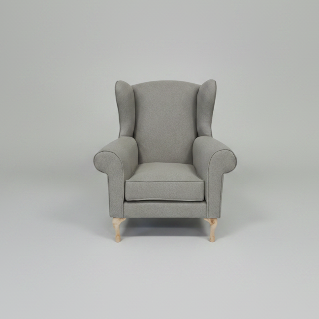 Gray armchair on a light gray background