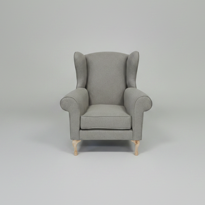 Gray armchair on a light gray background
