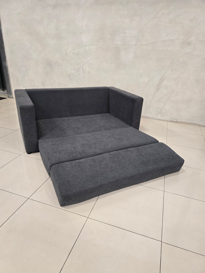 Customisable studio sleeper couch, ideal for multi-functional living.