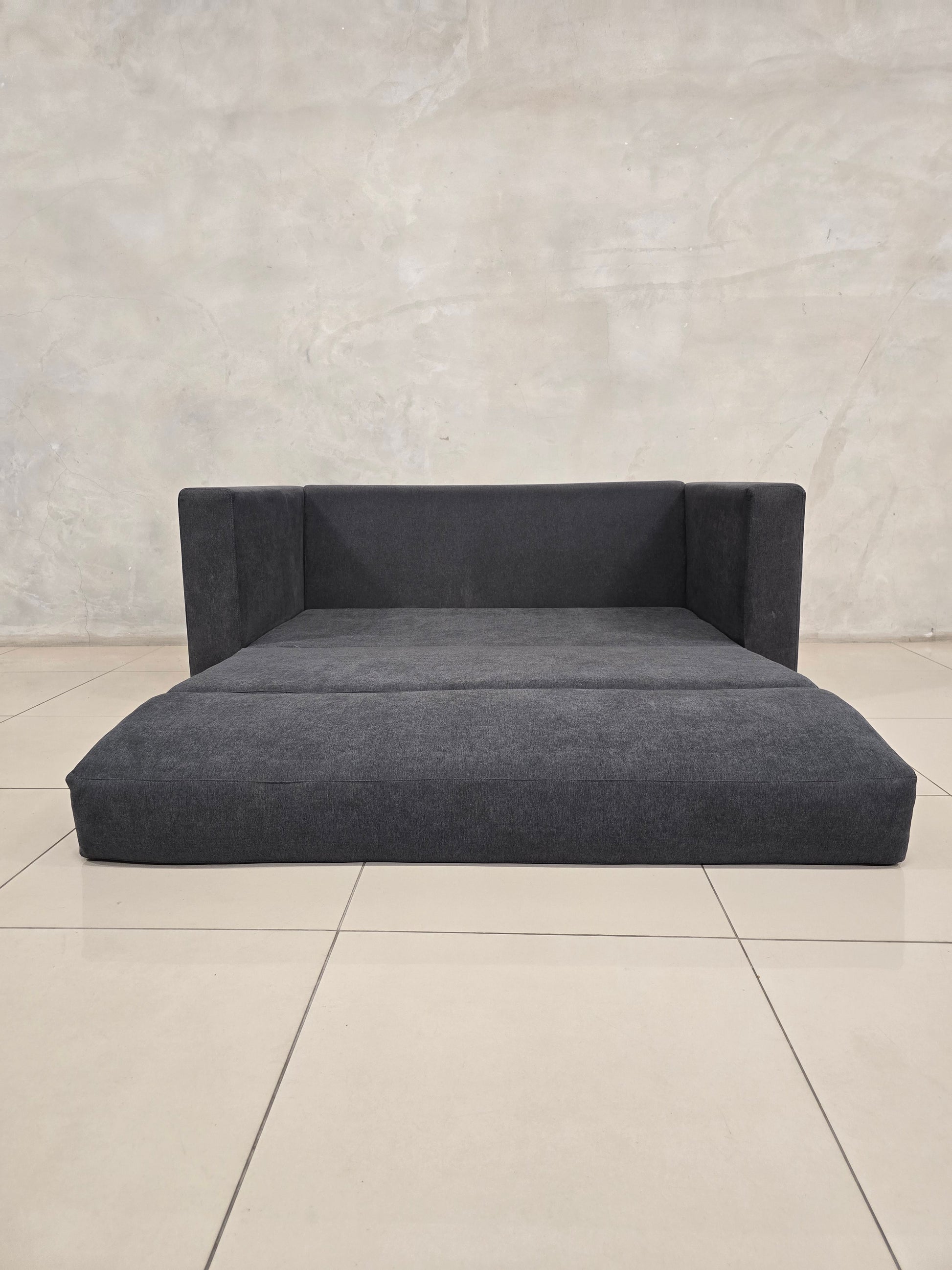 Space-saving sleeper sofa, made for contemporary and compact interiors.