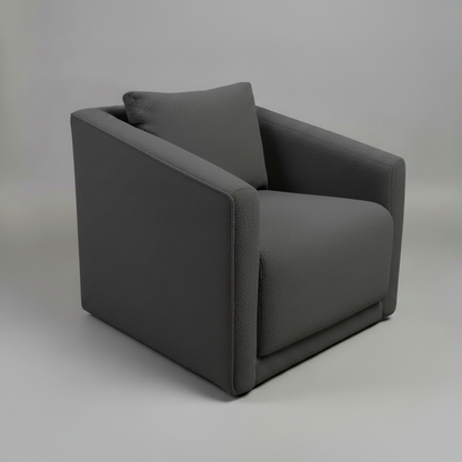 Gray armchair with a pillow on a light gray background