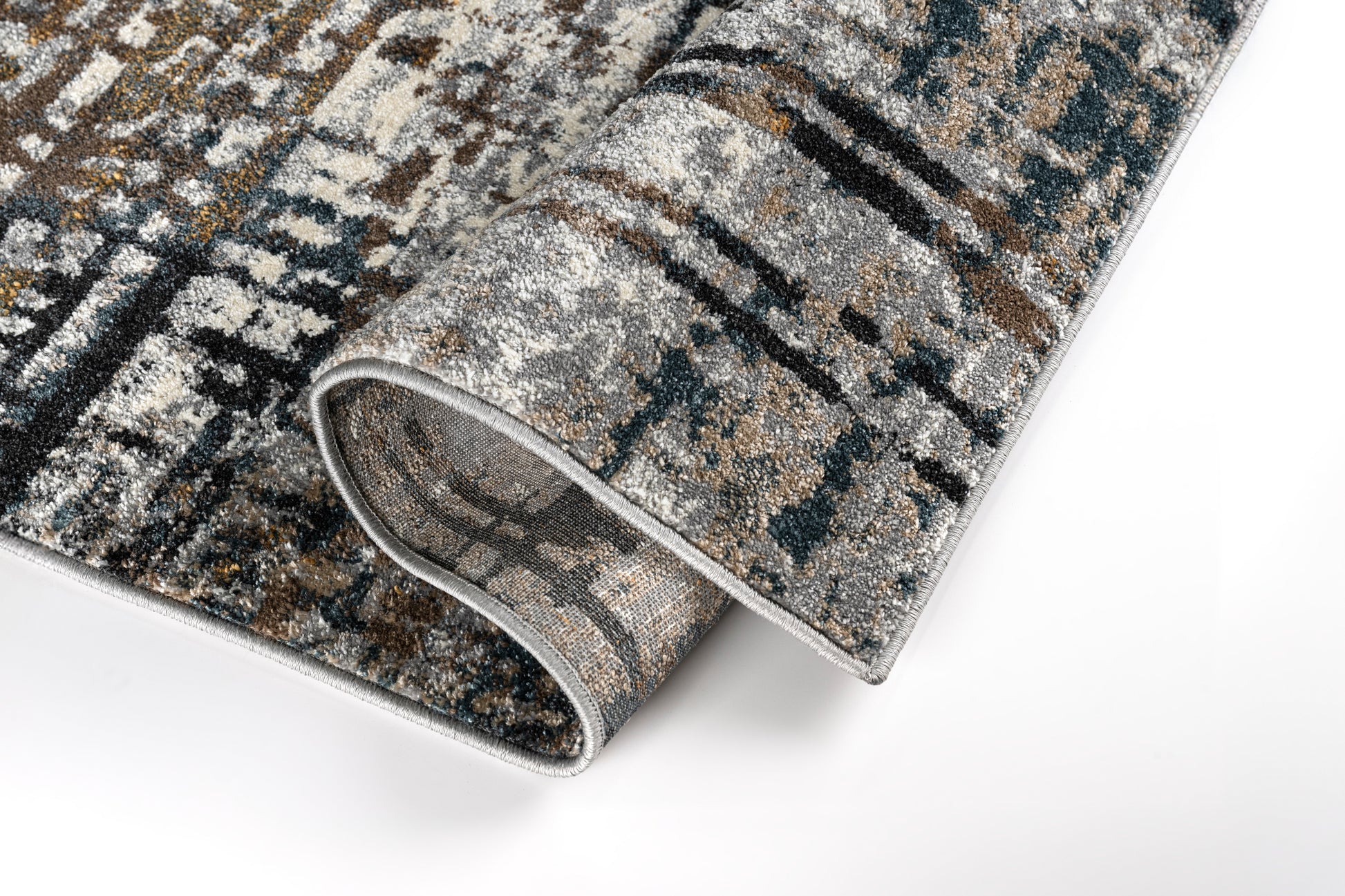 Patterned rug with a textured surface on a white background