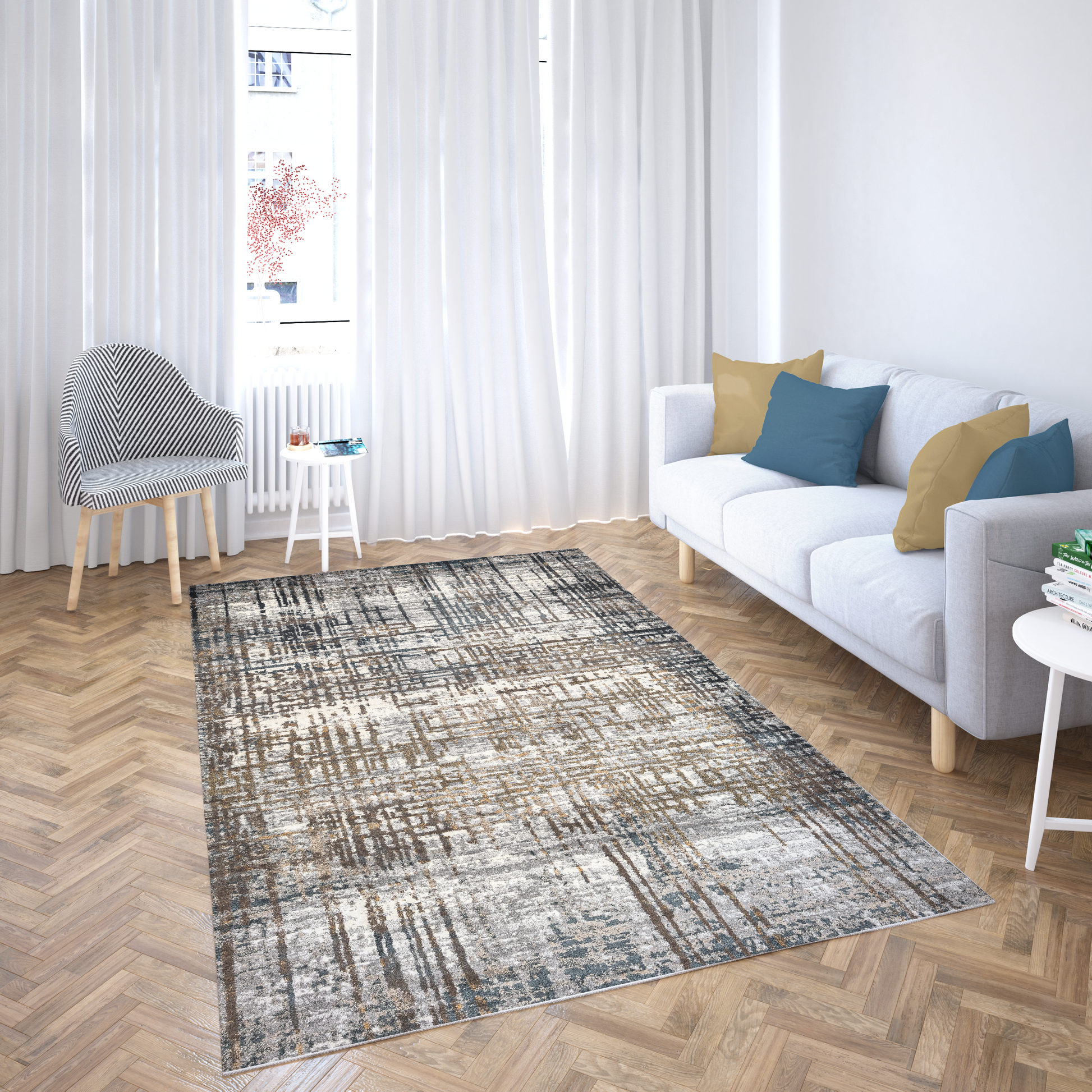 Living room with a patterned rug, white sofa, and striped chair.