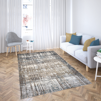 Living room with a patterned rug, white sofa, and striped chair.