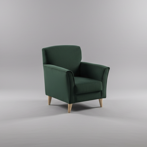 Green armchair on a gray background