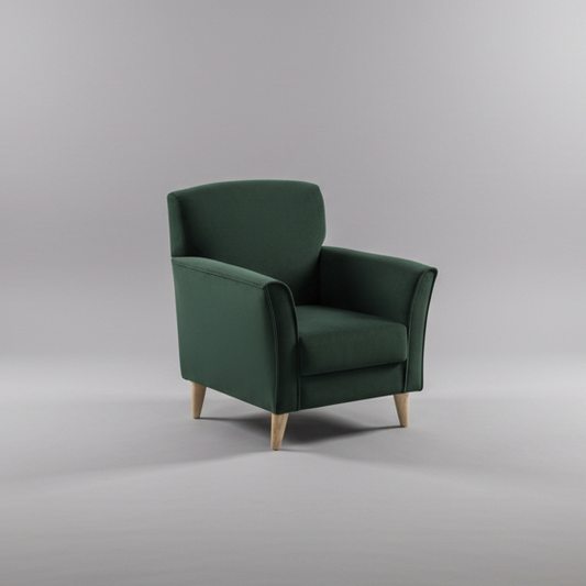 Green armchair on a gray background