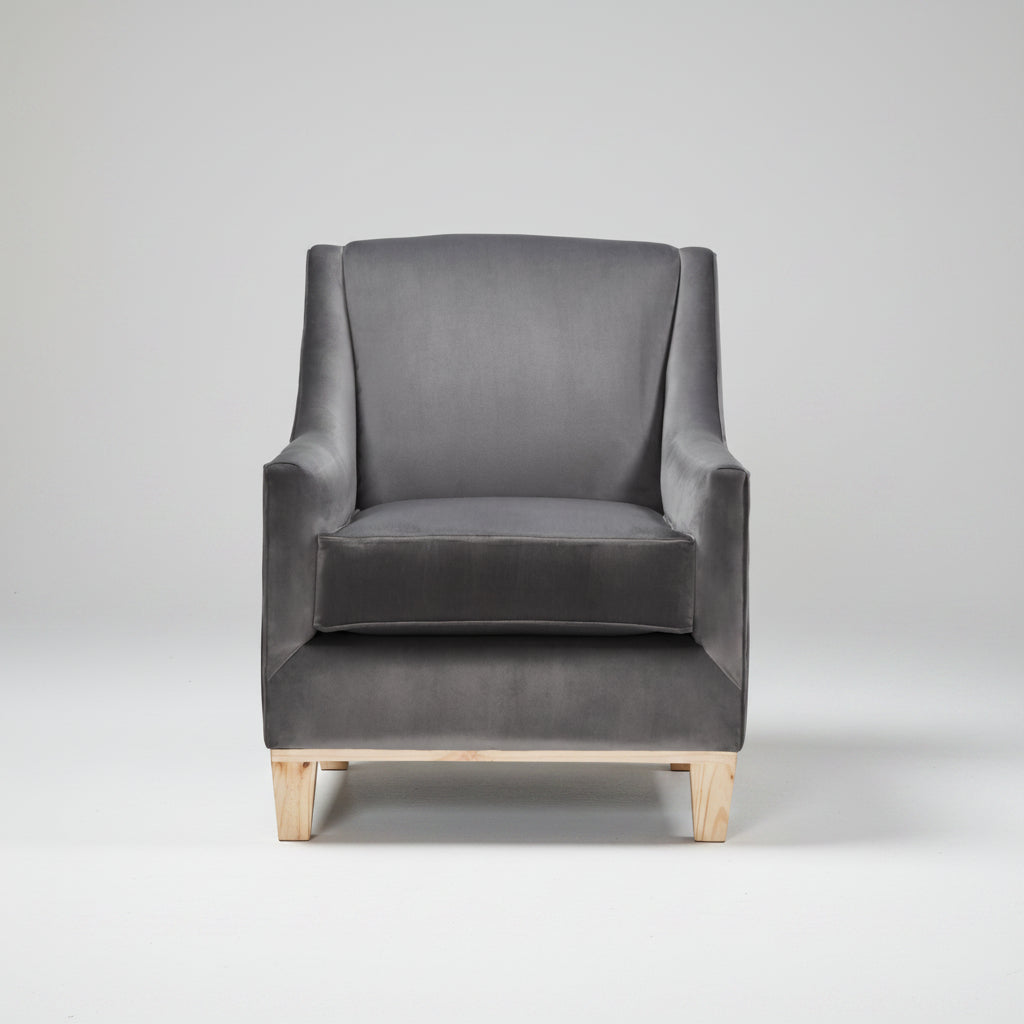 Gray armchair on a white background