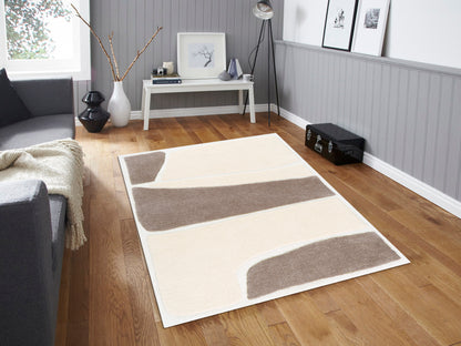 Christy Pumice rug styled in a living room