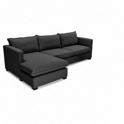 Black sectional sofa on a white background