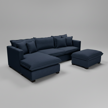 Navy blue sectional sofa with matching ottoman on a white background