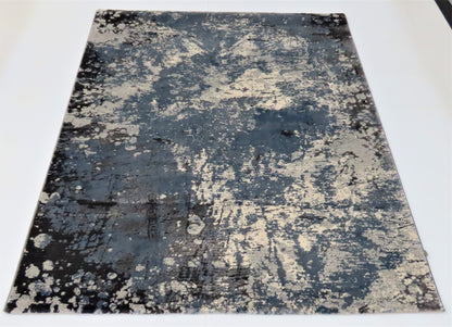 Abstract patterned rug on a white background
