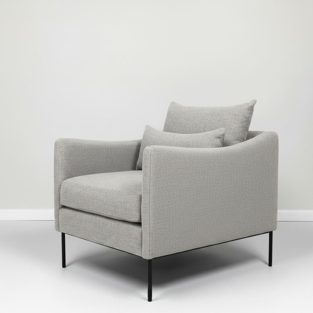 Gray armchair with two cushions on a white background
