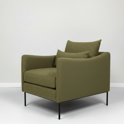 Green armchair with two cushions on a white background