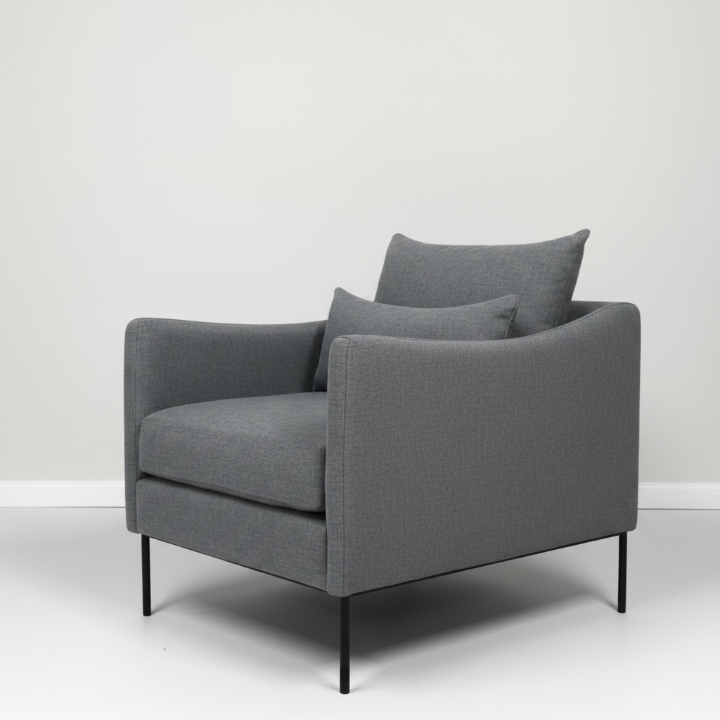 Gray armchair with two cushions on a white background