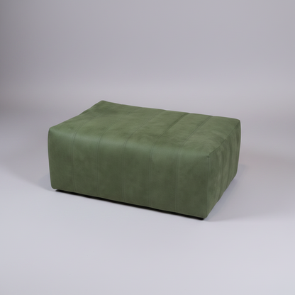 Green rectangular ottoman on a light gray background