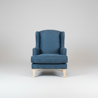 Blue armchair on a white background