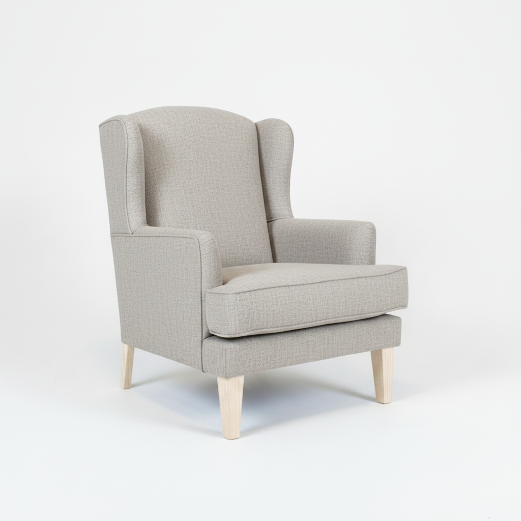 Gray wingback chair on a white background
