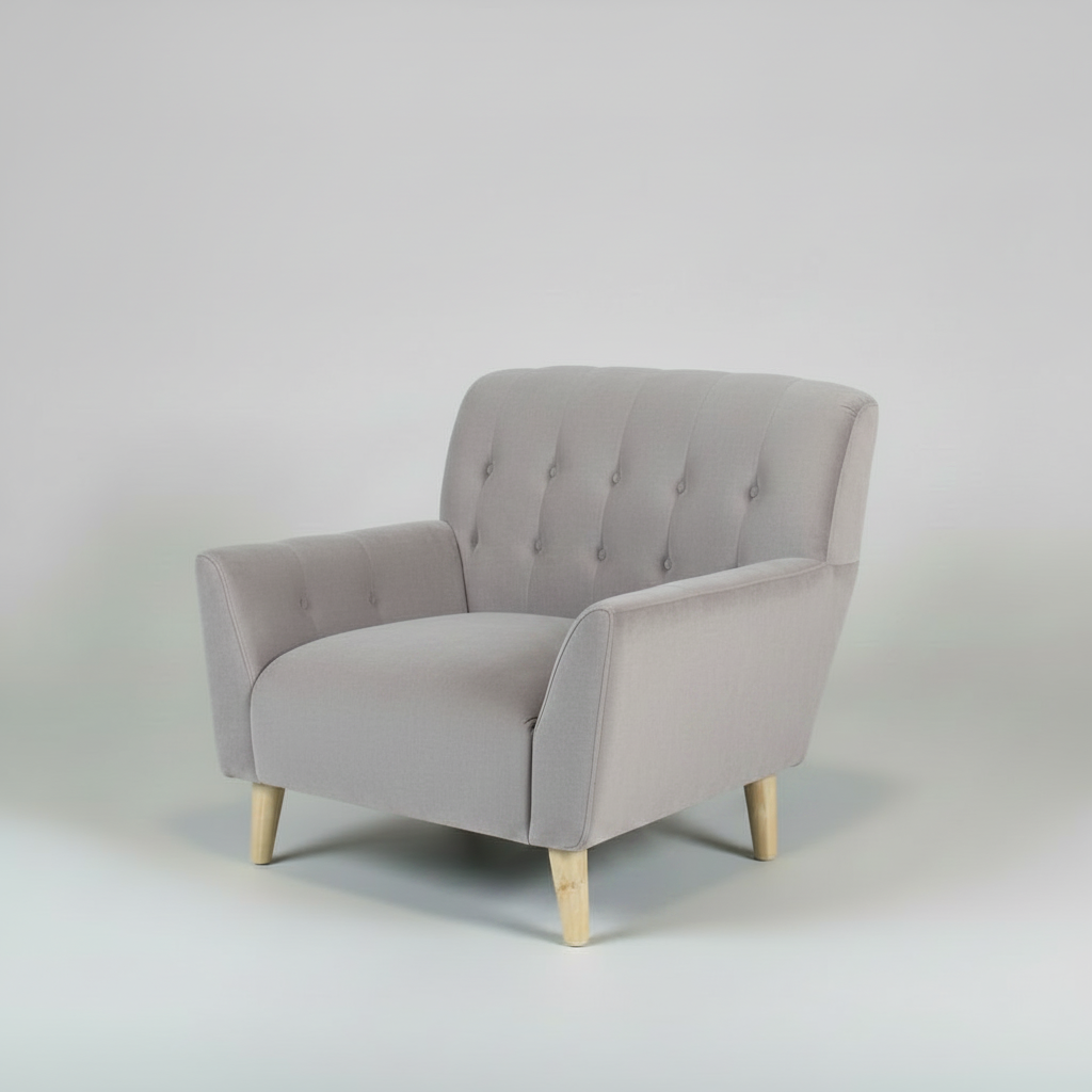 Gray armchair with wooden legs on a light gray background