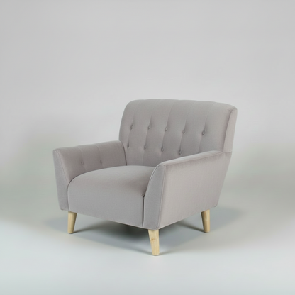 Gray armchair with wooden legs on a light gray background