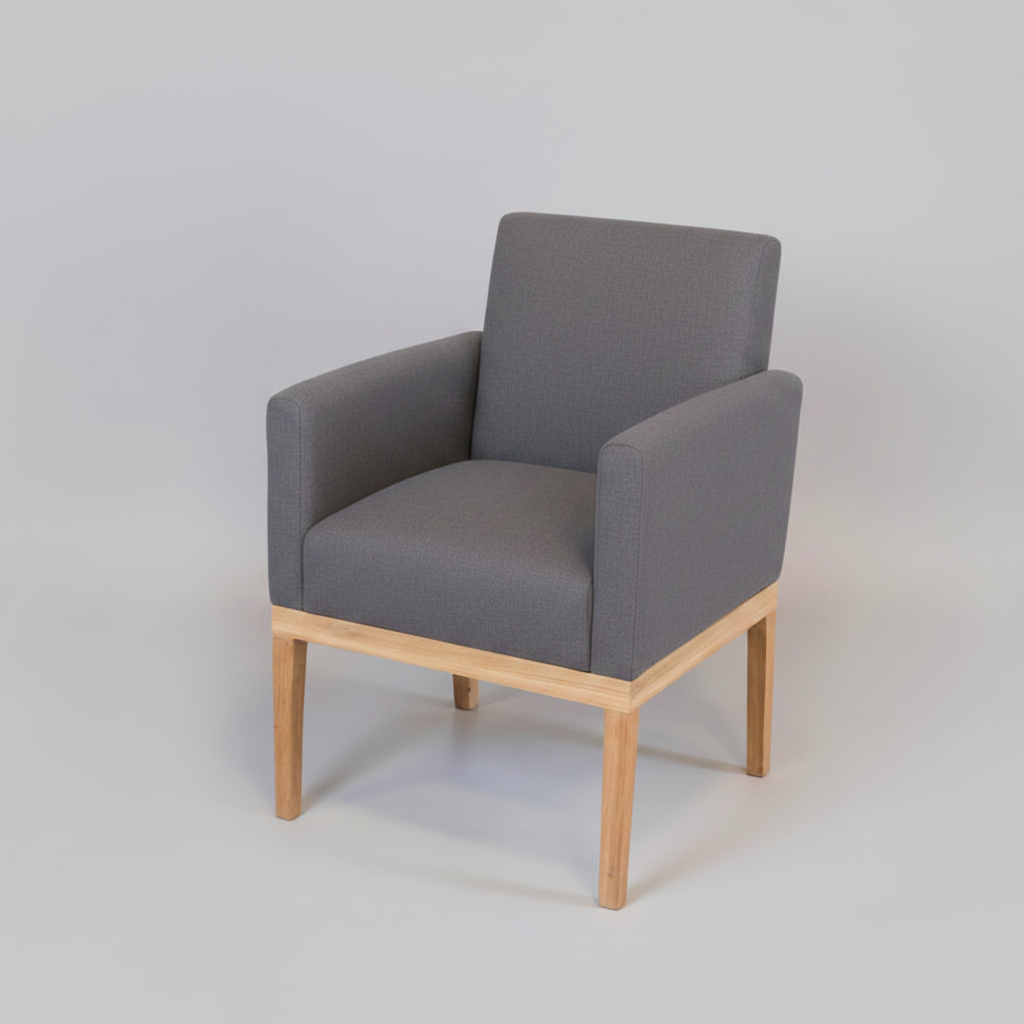 Gray armchair with wooden legs on a light gray background